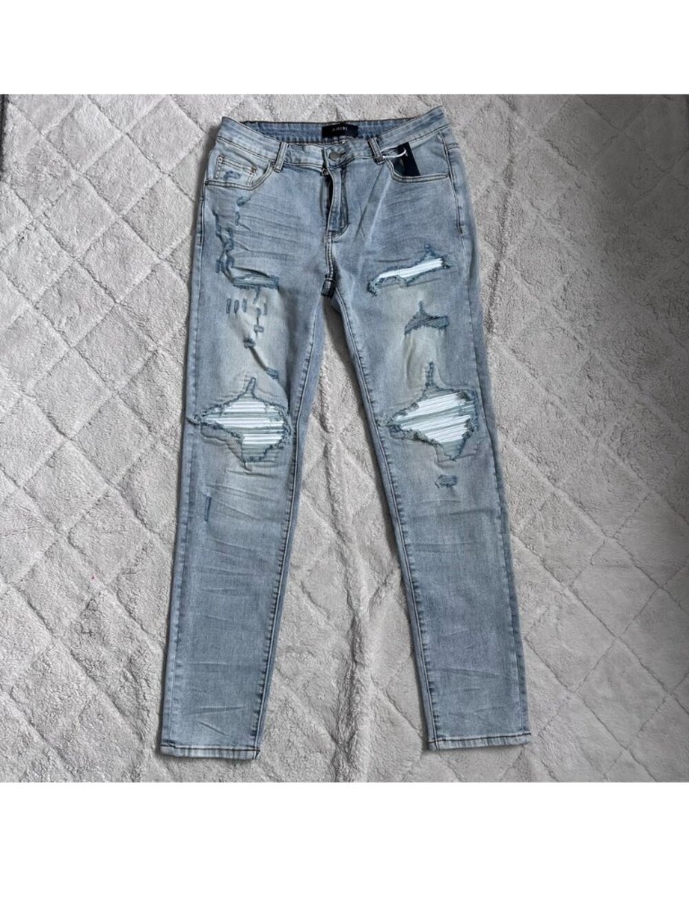 Amiri | Light Wash Denim Distressed Blowout Skinny Jeans | Size 32